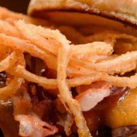 Wrangler · Cheddar cheese, bacon, onion straws, and bbq sauce