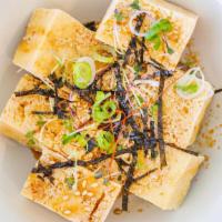 Crispy Tofu (Gf | V) · shallow fry tofu served with micro greens and house soy sauce