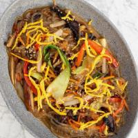 Beef Japchae (Gf) · glass noodles with beef bulgogi, onions, bell peppers, bok choy, carrots, vital farms eggs, ...