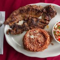 Romanian Steak Con Casamiento Y Ensalada · Romanian steak with rice, and salad or beans.