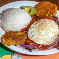 Bistec A Caballo · Grilled beef with hogao and onions, egg fried, white rice and avocado.
