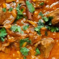 Lamb Curry · Tender chunks of boneless lamb cooked with a perfect blend of ginger, garlic and chef's secr...