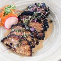 Chashu · Braised pork belly, creamy wasabi, and microgreens.