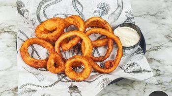 Onion Rings · Battered onion rings served with a spicy horseradish sauce