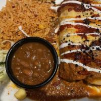 Masala Enchiladas · Choice of Chicken or Cheese-onion
enchiladas topped with a spicy queso-tikka masala sauce.