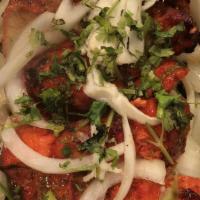 Tandoori Chicken · Bone-in dark meat chicken marinated in yogurt and indian spices. Grilled in the tandoor, and...