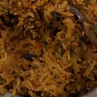 Biryani Vegetarian · This staple of southern indian cuisine has a base of basmati rice well spiced and mixed with...