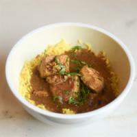 Chicken Tikka Masala · Chicken breast and thigh is stewed with tomato, ginger, garlic, cream, and house spices. Ser...