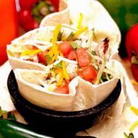 Chicken Taco Bowl · Tortilla bowl filled with chicken and topped with lettuce, cheddar cheese, pico de gallo, an...
