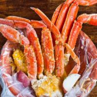 Snow Crab Leg (1 Lb) · Served with corn and potatoes and a choice of sauce.