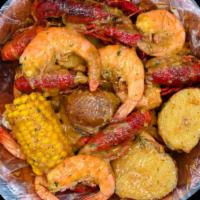 1 Lb Crawfish & 1 Lb Shrimp (Headless Shrimp Only)  · Served with corn and potatoes.