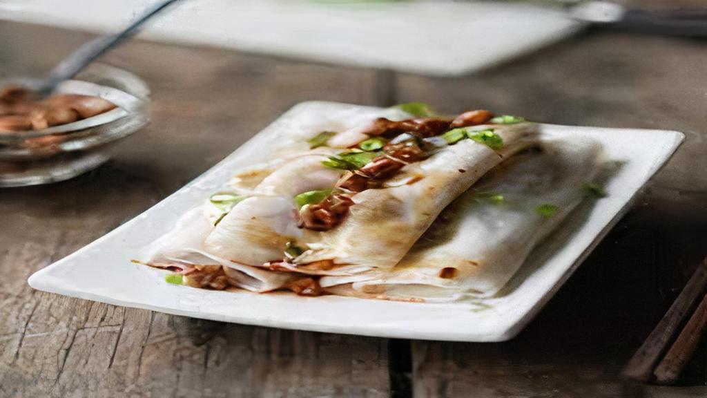 Jícama Roll (2 Pieces) · Peanut, lettuce, mint, cucumber, white onion, bean sprout, fried shallot wrapped in rice paper. Served with house sauce.