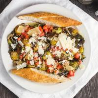 Brussels Sprouts · Halved and tossed in our lemon caper basil butter sauce; finished with bruschetta and topped...