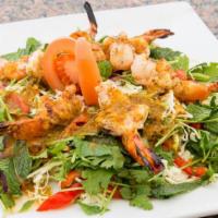 Spicy Grilled Shrimp (Phar Goong) · Spicy. Grilled shrimp, onion, tomato, lemon grass and lime leaves spiced with unforgettable ...