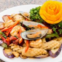 Spicy Seafood With Basil · Spicy. Sautéed shrimp, scallops, calamari, mussels with pepper, fresh garlic, basil, and hou...