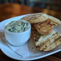 Spinach Artichoke Dip · Served with Tortilla Chips