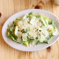 Caesar Salad · Organic Romaine, House Croutons, Shaved Parmesan, Caesar Dressing.