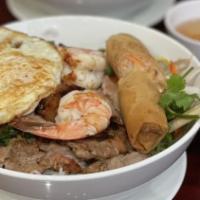 Combo Bowl · lemongrass chicken, pork, and shrimp, with a fried egg