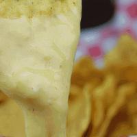 Vegan Chips & Queso 8Oz · Homemade vegan queso