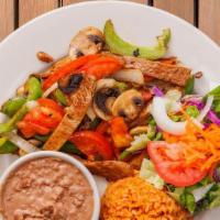 Vegan Veggie Fajitas Plate · Seitan strip sauteed with soy sauce, onion, tomatoe, mushroom &bell pepper. Included 2 torti...