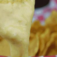 2 Oz Queso & Chips · 