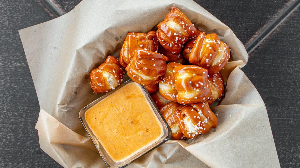 Pretzel Bites · With creole mustard and beer cheese dip.