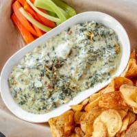Spinach Artichoke Dip · With pub chips and veggies.