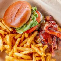 Western  · Grilled onions, Anaheim chiles, cheddar cheese, and applewood smoked bacon served with BBQ S...