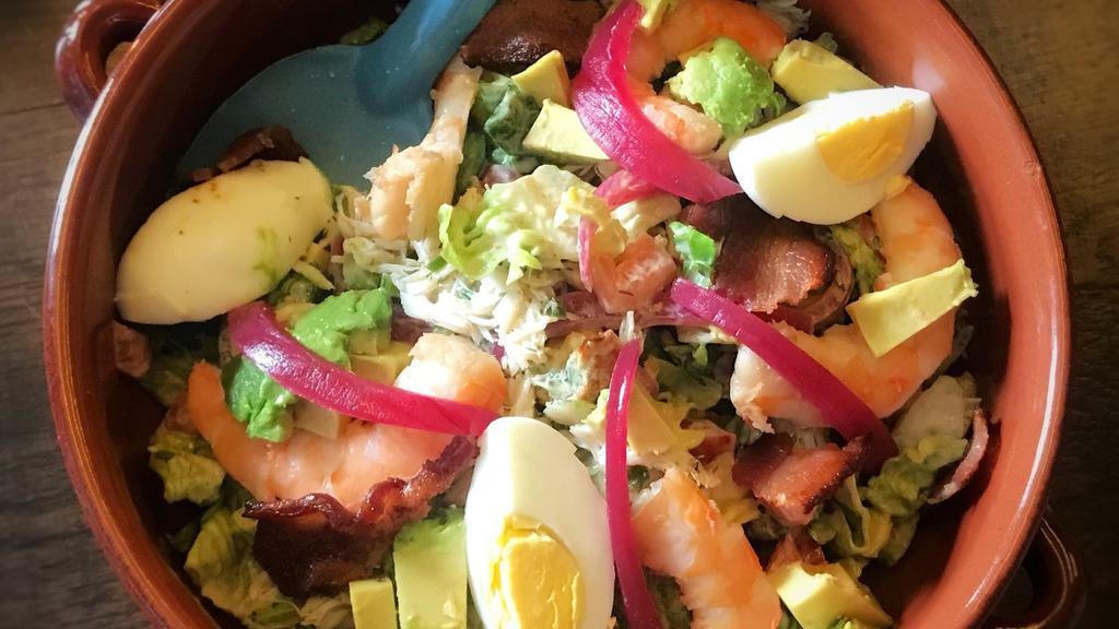 Seafood Chopped Salad · Blue crab, shrimp, tomato, bacon, egg, pickled red onion, avocado, green goddess