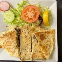 Quesadilla · Flour tortilla with melted mozzarella cheese and choice of meat served with salad