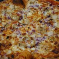 Buffalo Chicken · Buffalo Tomato Sauce, Mozzarella Blend, Blue Cheese, Grilled Chicken and Diced Red Onion