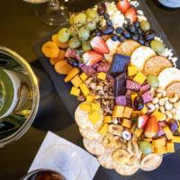 House Charcuterie Board Togo · Salami, Cheddar, Goat Cheese,  Grapes, Banana Chips, Strawberries, Blueberries, Walnuts & Ca...