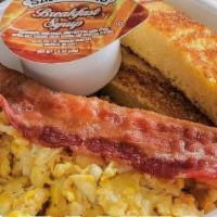 Breakfast Sampler · Made with 2 eggs, the meat of your choice, and 2 slices of French toast.