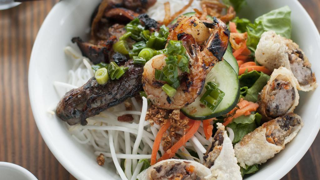 Combo Vermicelli Noodles · Grilled draper valley chicken thigh, shrimp, house-made beef and pork sausage, crispy imperial roll, rice vermicelli noodles, lettuce, bean sprout, cucumber, pickles, fresh herbs, roasted peanut, crispy shallot, nuoc cham.
