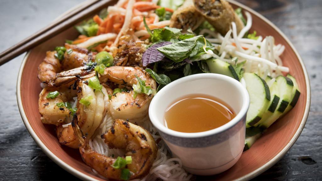 Grilled Prawn Vermicelli Noodles · Grilled shrimp, crispy imperial roll (shrimp and Carlton farms ground pork) rice vermicelli noodles, lettuce, bean sprout, cucumber, house-made pickles, fresh herbs, roasted peanut, crispy shallot, aged red boat nuoc cham.