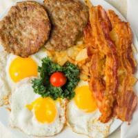 Breakfast Platter · Choice of meat, two eggs any style, home fries or grits, and a toast.
