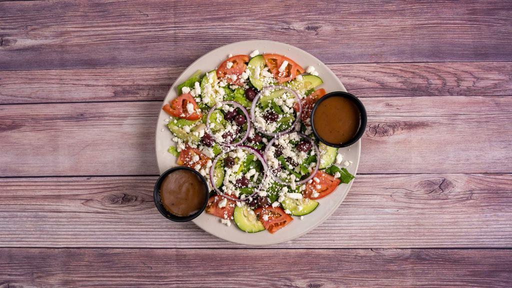 Greek Salad · Romaine lettuce, kalamata olives, tomato, red onion, cucumber, feta cheese & balsamic dressing.