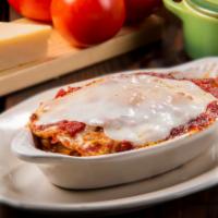 Homemade Lasagna · Spicy Italian sausage smothered with cheese & baked in our home made tomato sauce.