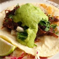 Birria Tacos. · SLOW COOKED SHORT RIB | AVOCADO SALSA | ONIONS | CILANTRO