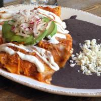 Enchiladas Rojas · CHICKEN | AVOCADO | SOUR CREAM | MELTED CHIHUAHUA | REFRIED BEANS | CORN TORTILLAS | SALSA R...