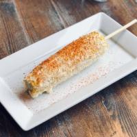 Elote Loco. · GRILLED CORN ON THE COB | MAYONNAISE| COTIJA CHEESE | CHILI POWDER