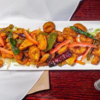  Spice Calamari · Fried squid sautéed with onion and bell pepper in tangy spiced sauce.