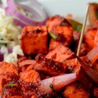 Chilli Paneer · Deep fried Paneer sautéed with onions & green chilies and sweet and sour sauce