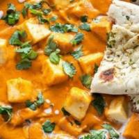 Paneer Butter Masala · Cottage Cheese cubes cooked in creamy and rich buttery sauce