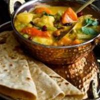Navratan Korma · Rich and creamy vegetables dish made of nine ingredients which are cooked together in a supe...