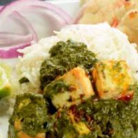 Saag Paneer · Spinach cooked with homemade cheese cubes & spice