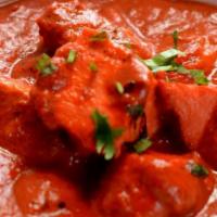 Butter Chicken · Chicken sauteed in tomato based sauce with butter and blend of spices