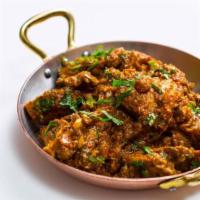 Bhuna Masala · Amritsari style exotic curry smeared in tomato sauce with fresh fragrance of ginger, garlic,...