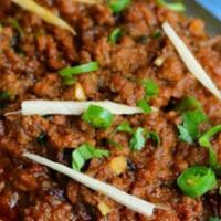 Goat Kheema Masala · Minced goat meat cooked in delicately ground spices and onions
