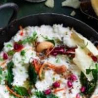 Curd Rice W/Pickles · Freshly Made Indian curd (yogurt) rice Sauteed in Indian Spices and Curry Leaves. Served wit...
